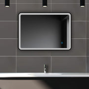 Bathroom mirror with demister – close-up of mirror edge and anti-fog heating demister pad feature