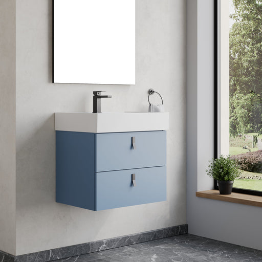 Wall hung vanity unit powder blue – close‑up of matt black handles and powder‑blue lacquered drawer front on Banyetti Invicta unit