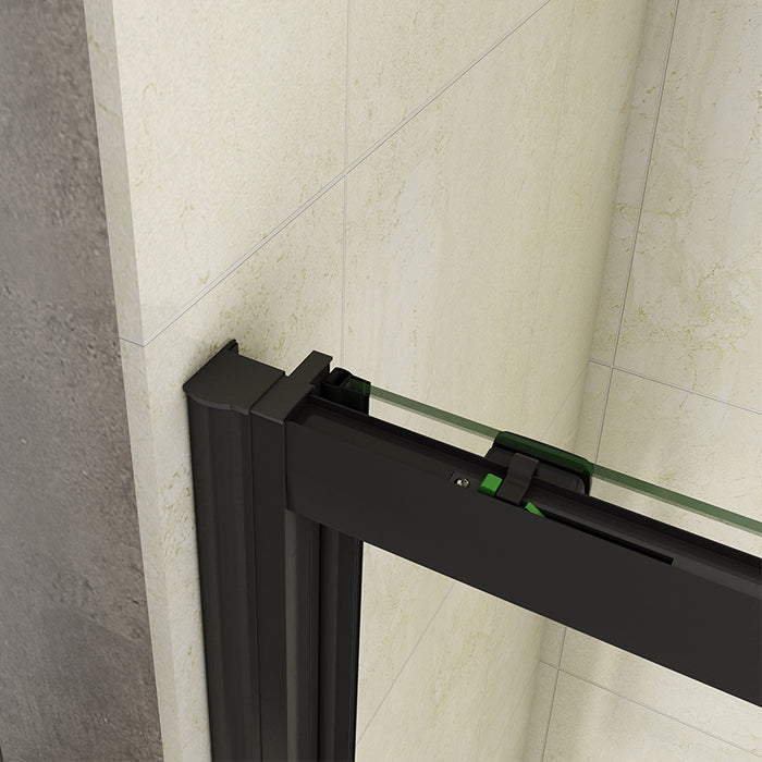 Detail of reversible wall profile and matt black frame on sliding shower door