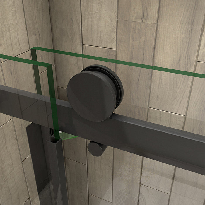 Close-up of matt black sliding roller system on frameless shower door