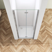 Chrome aluminium wall profile on a frameless bifold shower door