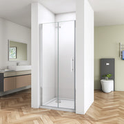 Front view of Linea chrome frameless bifold shower door with clear glass