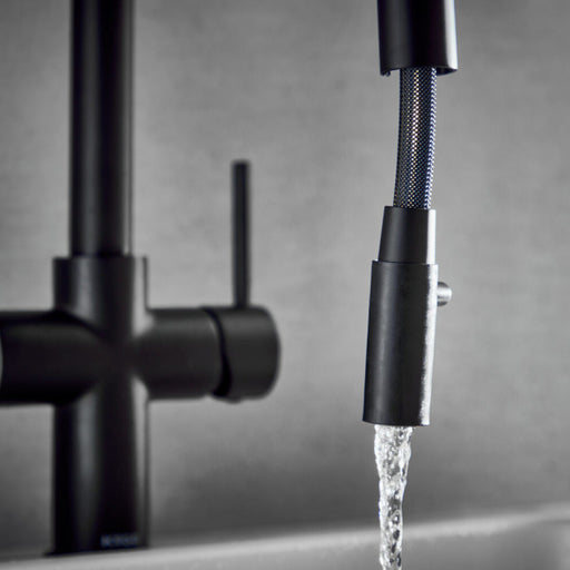 4‑in‑1 kitchen tap matt black – close‑up of control lever and safety button on matt black 4‑in‑1 tap