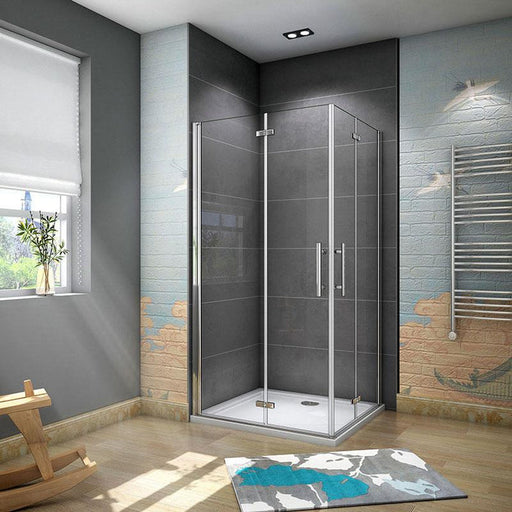 Corner entry shower enclosure – chrome framed bifold-pivot door 700 × 700mm size installed in bathroom