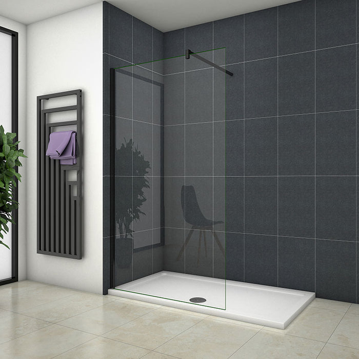 Installed Linea black framed walk-in shower panel in a contemporary wet room bathroom