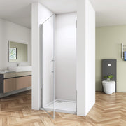 Modern bathroom featuring a chrome frameless pivot shower door