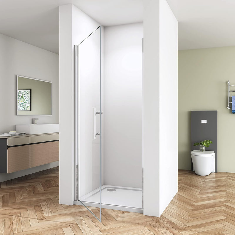 Modern bathroom featuring a chrome frameless pivot shower door