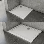 White rectangular shower tray with included 90mm chrome waste