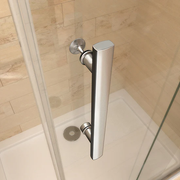 Reversible chrome bifold shower door suitable for left or right-hand installation