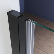 Side profile of black frameless bifold shower door
