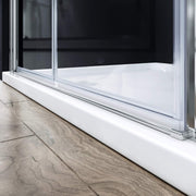 Side profile of slim chrome frameless bifold shower door