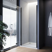Black frameless bifold shower door shown folded open to save space