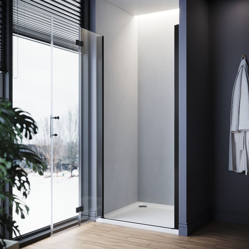Black frameless bifold shower door shown folded open to save space